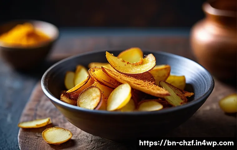 식재료 인생 활용하기 주방에서의 재발견 - **Prompt:** A close-up, mouth-watering shot of crispy, golden-brown potato peel snacks served in a r...